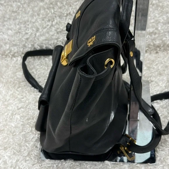 MCM Black Leather Backpack with Gold Accents - Picture 5 of 15